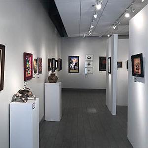 Second Floor Gallery with artwork hanging on walls